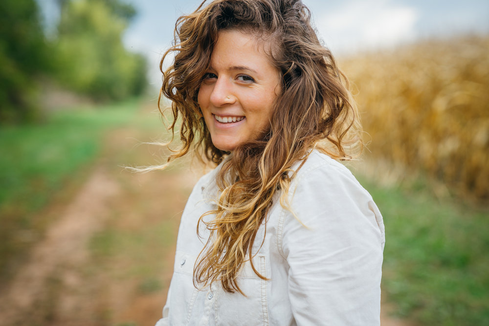 Portrait of Charity apple picking